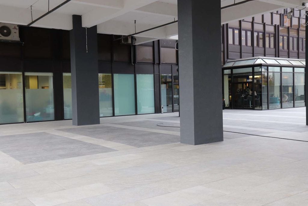 a completed DPH pedestal system under porcelain paving