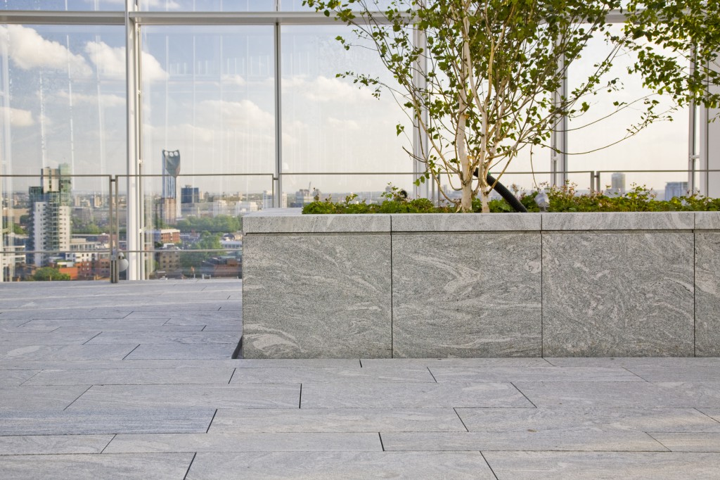 hidden buzon pedestals holding up paving slabs in a modern city